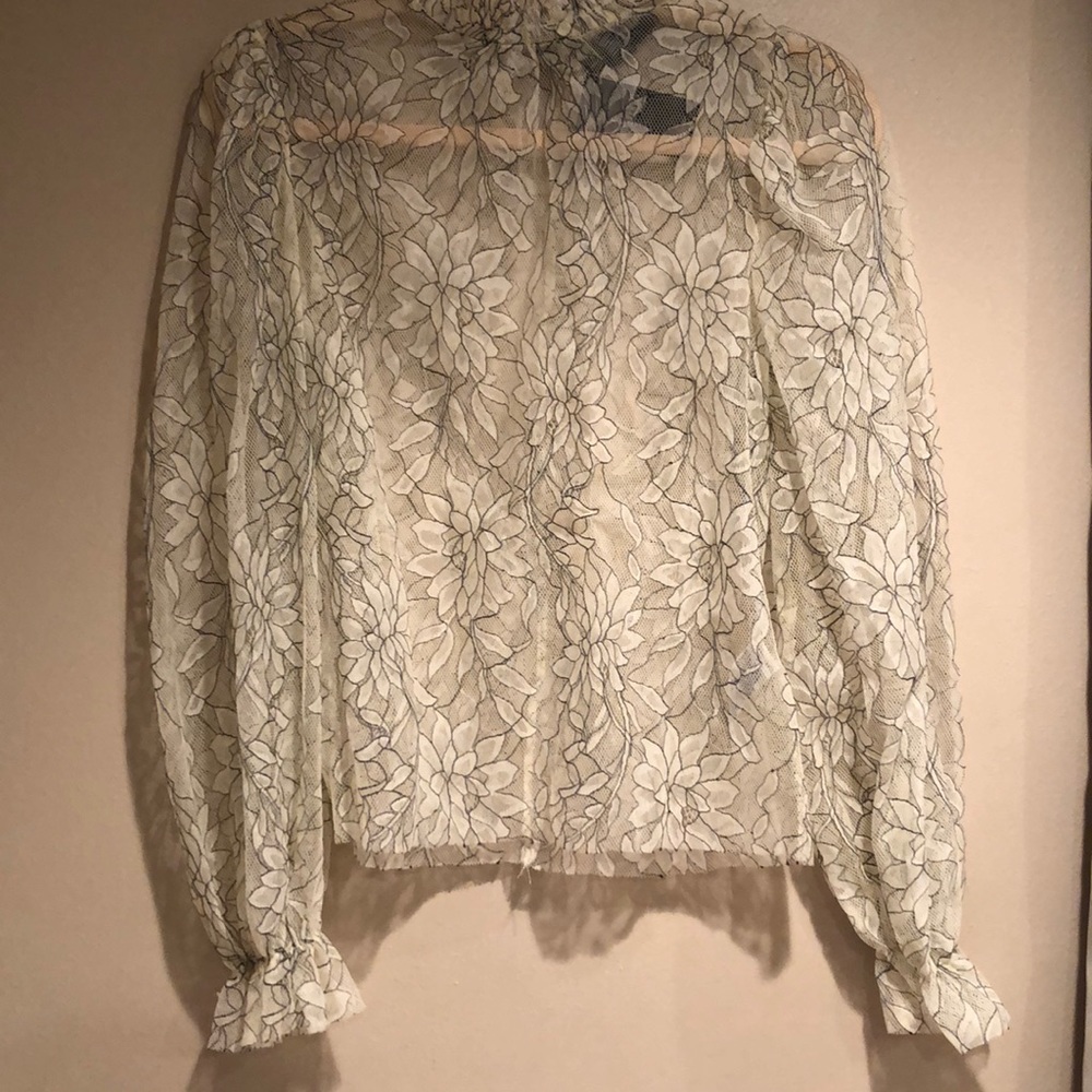 Sheer floral mock turtleneck